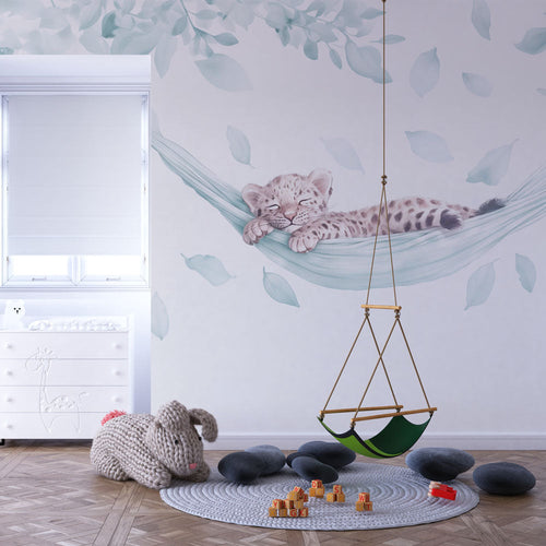 Animal wallpaper with a baby leopard dozing in a hammock among leaves