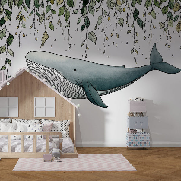 Whale Wallpaper | Elegant Whale Gliding Beneath Delicate Foliage