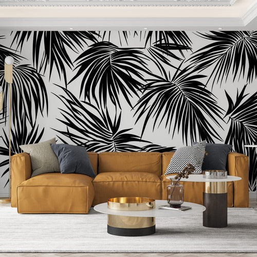 Black and white foliage wallpaper with bold tropical leaves