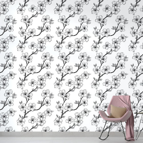 Black floral branches wallpaper on white background in modern living room