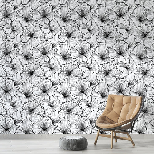 Detailed black and white flowers wallpaper on light background