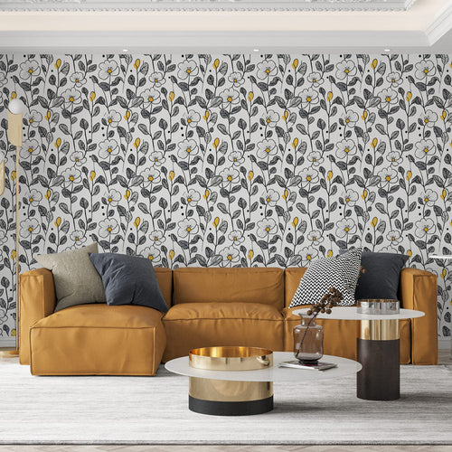 Black and white floral wallpaper with yellow touches on light background