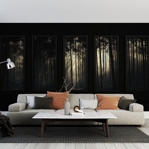 Black and white enchanted forest wallpaper mural with tall trees in diffused light