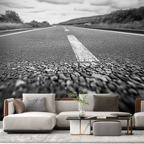 Black and white asphalt road wallpaper with dynamic perspective and textured pavement